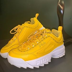 Yellow Fila Disruptors 2